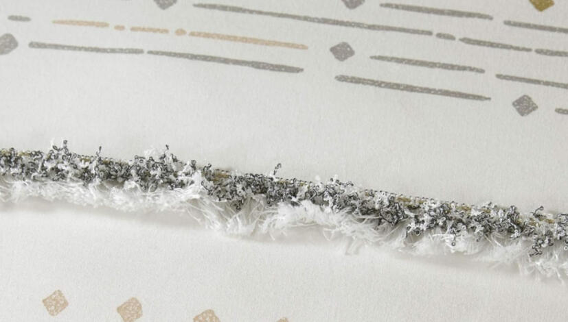 Neutral cotton jacquard comforter set with soft woven stripes and eyelash texture on a light oak bedframe, styled in a cozy boho farmhouse bedroom.