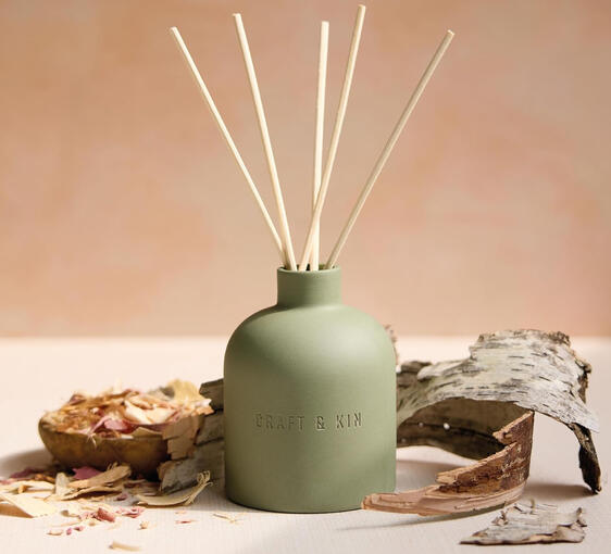 Neutral reed diffuser, non-toxic and welcoming fragrances, simple decor for bedroom or living space.
